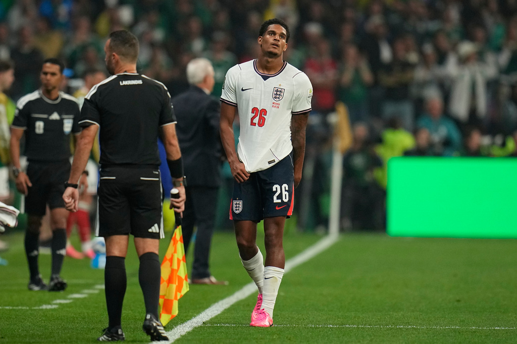 England's Jarell Quansah (26) reacts after receiving a red card during the World Cup round of 16 soccer match between Mexico and England in Mexico City, Sunday, July 5, 2026. (AP Photo/Ricardo Mazalan)