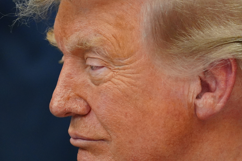 President Donald Trump speaks in the Oval Office of the White House about Dulles International Airport modernization, Wednesday, July 29, 2026, in Washington. (AP Photo/Julia Demaree Nikhinson)