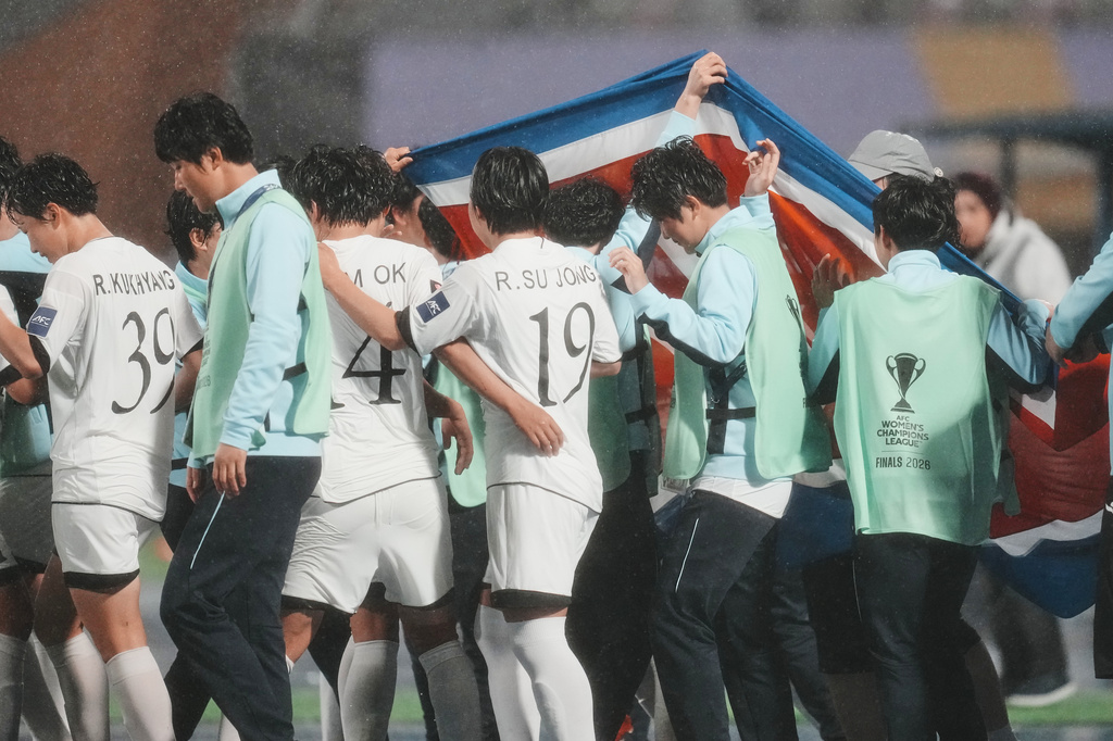 North Korea's Naegohyang Women's FC players celebrate after defeating South Korea's Suwon FC in their AFC Women's Champions League semifinal match in Suwon, South Korea, Wednesday, May 20, 2026. (AP Photo/Lee Jin-man)