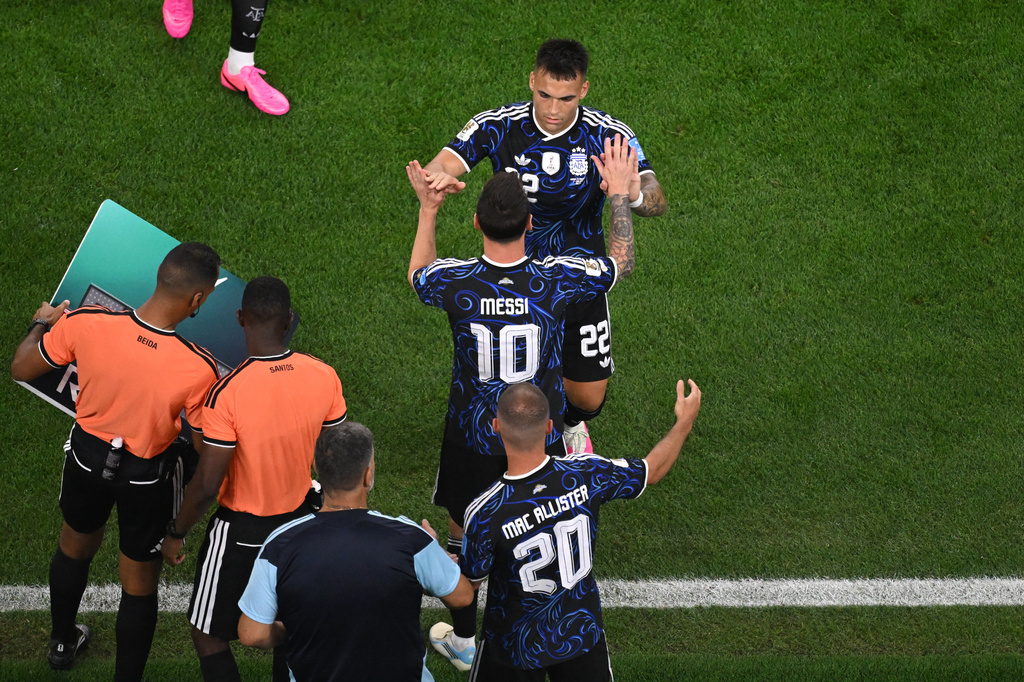 Argentina's Lautaro Martinez (22) is substituted by Argentina's Lionel Messi (10) during the World Cup Group J soccer match between Jordan and Argentina in Arlington, Texas, near Dallas, Saturday, June 27, 2026. (AP Photo/Jessica Tobias)