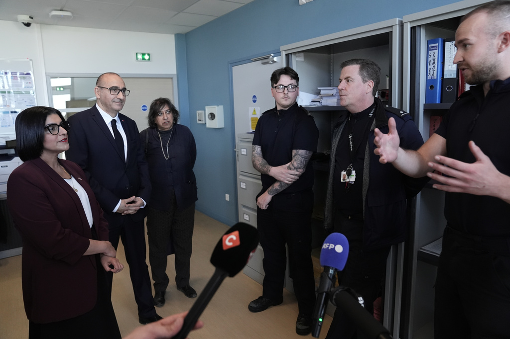 Britain's Home Secretary Shabana Mahmood meets British Border Force staff with French Interior Minister Laurent Nunez during her visit in Dunkirk, France, Thursday April 23, 2026. (Stefan Rousseau/Pool Photo via AP)