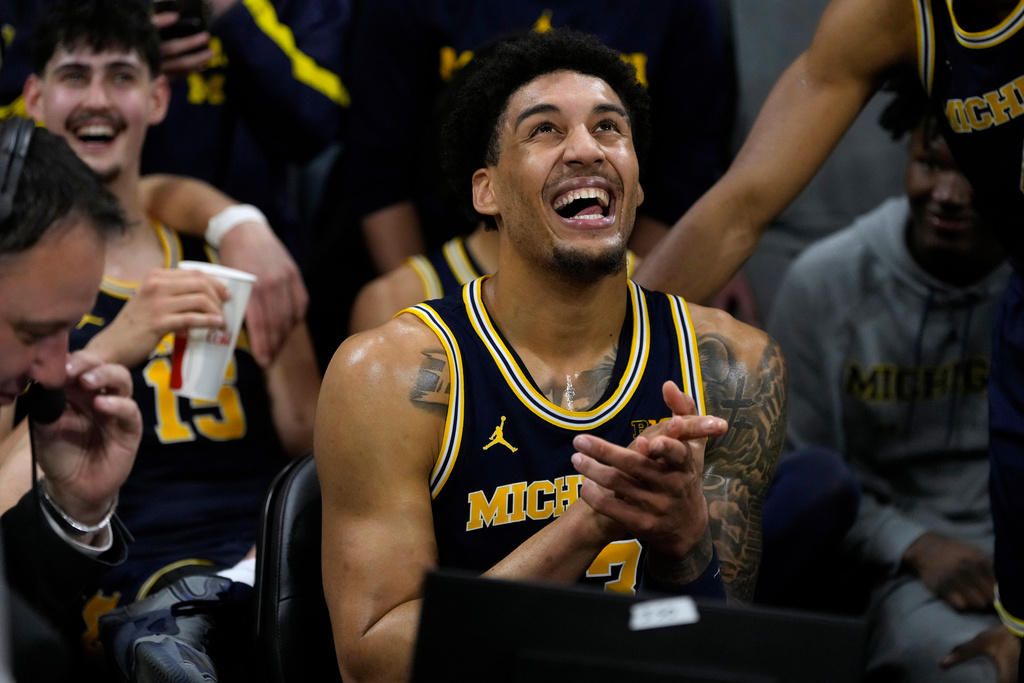 Michigan forward Yaxel Lendeborg celebrates after an NCAA college basketball game against Iowa, Thursday, March 5, 2026, in Iowa City, Iowa. (AP Photo/Charlie Neibergall)