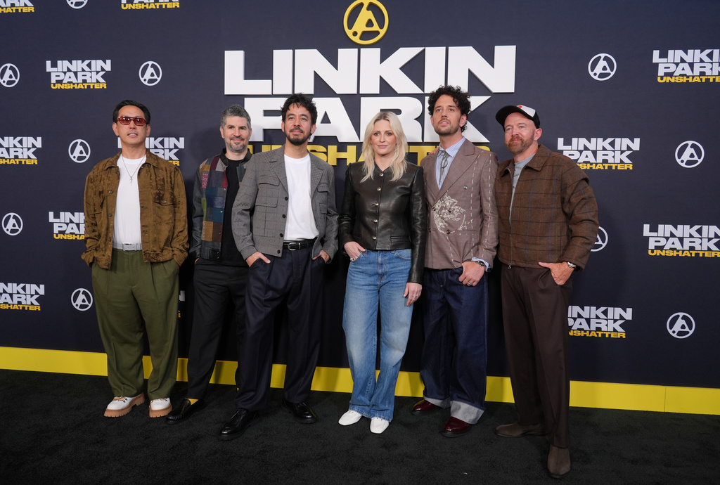 From left, Joe Hahn, Brad Delson, Mike Shinoda, Emily Armstrong, Colin Brittain and Dave Farrell of the band Linkin Park pose together at the premiere of the documentary film "Linkin Park: Unshatter" on Thursday, Sept. 24, 2026, at AMC The Grove 14 in Los Angeles. (AP Photo/Chris Pizzello)