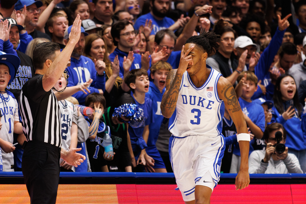 Duke's Isaiah Evans (3) celebrates after hitting a three-pointer during the first half of an NCAA college basketball game against Niagara in Durham, N.C., Friday, Nov. 21, 2025. (AP Photo/Ben McKeown)