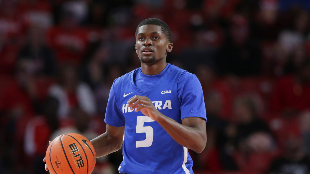 FILE - Hofstra guard Cruz Davis dribbles down court during the first half of an NCAA college basketball game against Houston, Nov. 22, 2024, in Houston. (AP Photo/Michael Wyke, file)