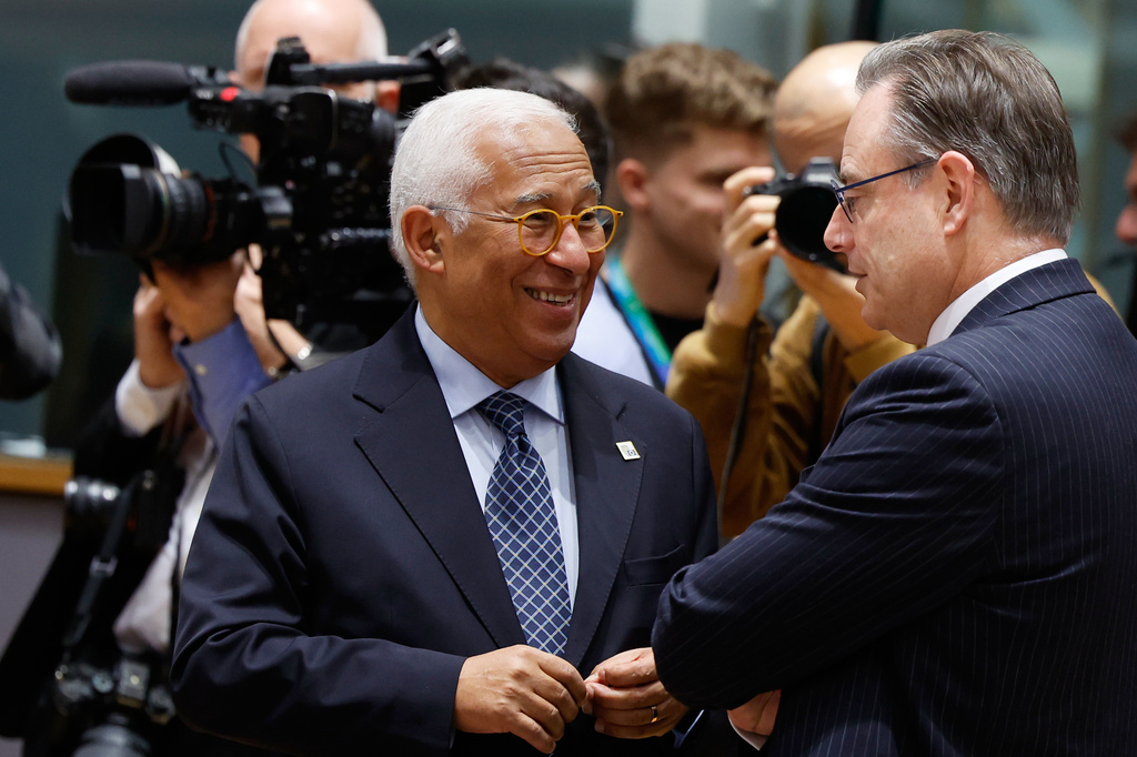 European Council President Antonio Costa, center, speaks with Belgium's Prime Minister Bart De Wever during a round table meeting at the EU Summit in Brussels, Thursday, Dec. 18, 2025. (AP Photo/Geert Vanden Wijngaert)