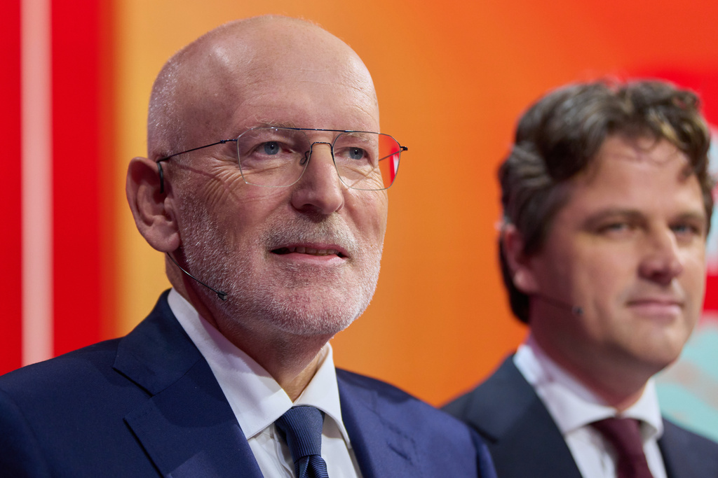 Frans Timmermans, of the center-left two-party bloc of Labor Party and Green Left, and Henri Bontenbal, party leader of the Christian Democratic Appeal, CDA, right, pose for a photo prior to a debate at the SBS6 TV studio in Hilversum, Netherlands, Thursday, Oct. 23, 2025. (AP Photo/Peter Dejong)
