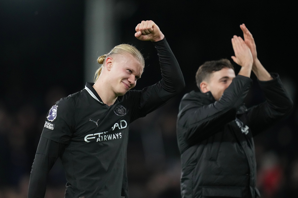 Manchester City's Erling Haaland, reacts after his teams win during the English Premier League soccer match between Fulham and Manchester City in London, Tuesday, Dec. 2, 2025. (AP Photo/Kirsty Wigglesworth)