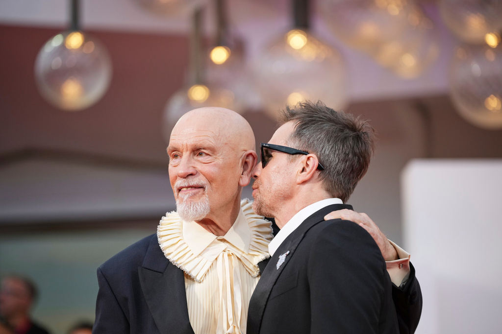 John Malkovich, left, and Sam Rockwell pose for photographers at the red carpet for the film 'Wild Horse Nine' during the 83rd edition of the Venice Film Festival in Venice, Italy, on Thursday, Sept. 3, 2026. (Photo by Alessandra Tarantino/Invision/AP)