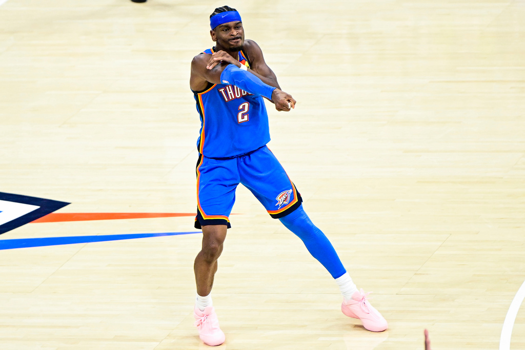 Oklahoma City Thunder guard Shai Gilgeous-Alexander (2) gestures during the second half of an NBA basketball game against the Denver Nuggets Monday, March 9, 2026, in Oklahoma City. (AP Photo/Gerald Leong)