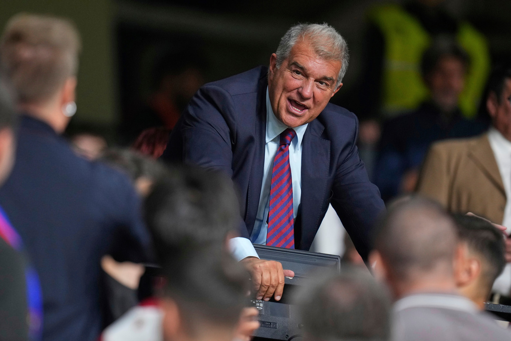 FC Barcelona's 100,000-plus members vote for president with club buried under a mountain of debt