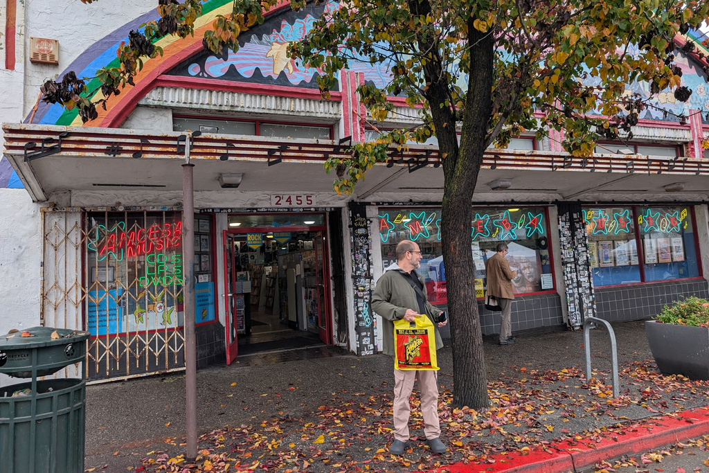 A shopper stands in front of Amoeba Music in Berkeley, Calif., on Saturday, Dec. 20, 2025. (AP Photo/Michael Liedtke)