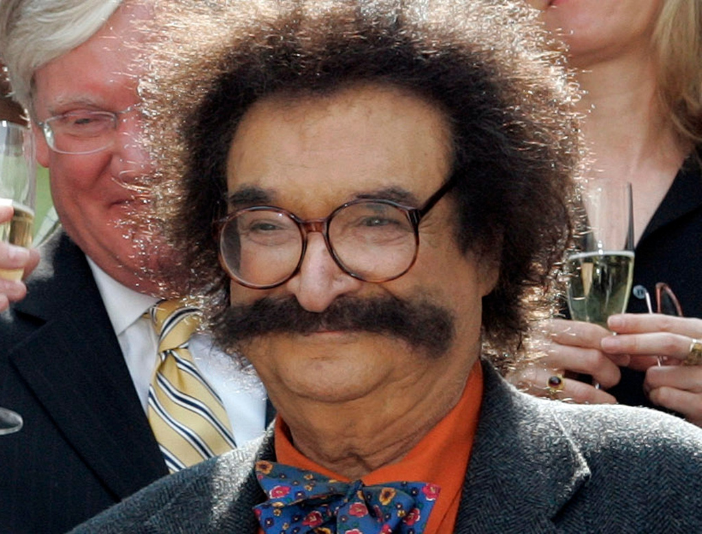 FILE - In this May 31, 2006 file photo, film critic Gene Shalit is seen during a toast with "Today" show cast and crew at the end of Katie Couric's final show, in New York. (AP Photo/Richard Drew, File)