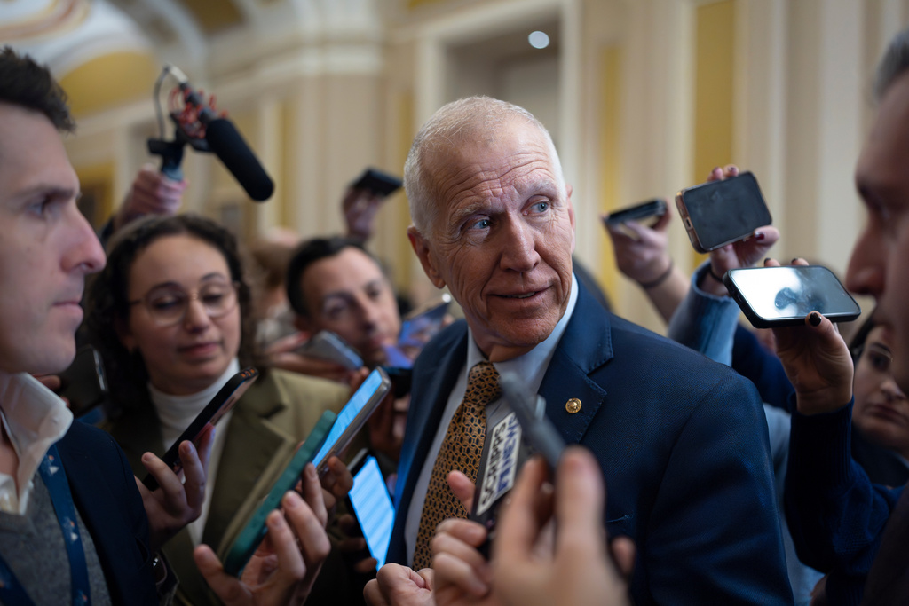 Sen. Thom Tillis, R-N.C., speaks with reporters following a closed-door meeting with fellow Republicans on spending legislation that funds the Department of Homeland Security and a swath of other government agencies, at the Capitol in Washington, Wednesday, Jan. 28, 2026. (AP Photo/J. Scott Applewhite)