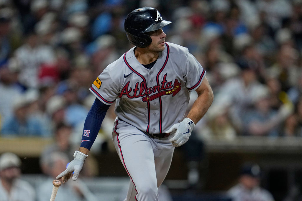 Atlanta Braves' Matt Olson watches his hit for a single during the sixth inning of a baseball game against the San Diego Padres Monday, June 22, 2026, in San Diego. (AP Photo/Gregory Bull)