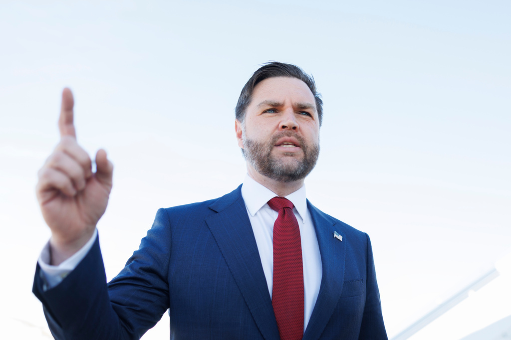 Vice President JD Vance speaks to reporters before boarding Air Force Two at Joint Base Andrews in Md., on Tuesday, Dec. 16, 2025. (Tom Brenner/The New York Times via AP, Pool)