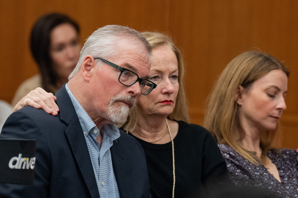 Loved ones who lost girls in the July 4th flood react to testimony from camp director Edward Eastland as they attend a hearing on a suit against Camp Mystic in the 459th State District Court in Austin, Monday, April 13, 2026. (Mikala Compton/Austin American-Statesman via AP)