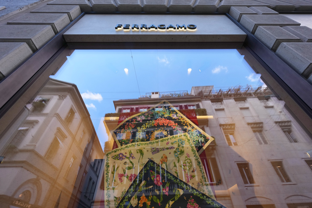 A Salvatore Ferragamo story is seen in downtown Milan, Italy, Wednesday, April 22, 2026. (AP Photo/Antonio Calanni)