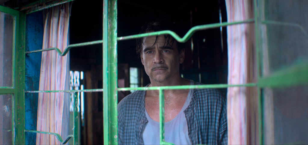 This image released by Netflix shows Colin Farrell in a scene from "Ballad of a Small Player." (Netflix via AP)