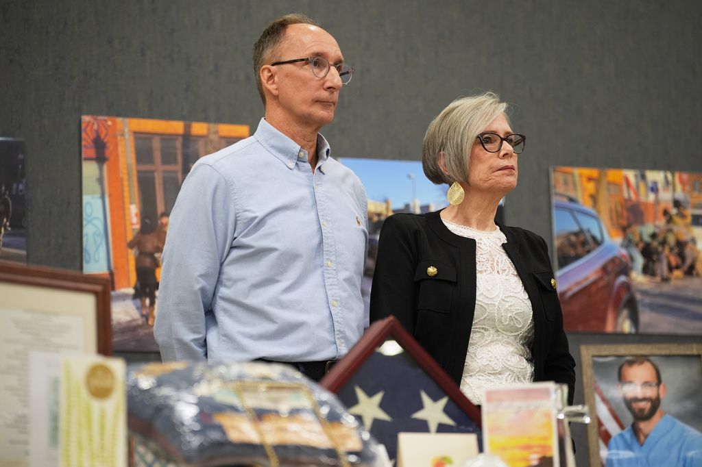 Michael Pretti and Susan Pretti, parents of Alex Pretti, who was killed by federal immigration agents in January, listen during a news conference, Tuesday, Oct. 27, 2026, in Minneapolis. (AP Photo/Ellen Schmidt)