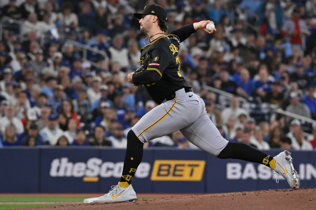 Pittsburgh Pirates pitcher Paul Skenes (30) throws to a Toronto Blue Jays batter during the first inning of a baseball game in Toronto, Saturday, May 23, 2026. (Jon Blacker/The Canadian Press via AP)