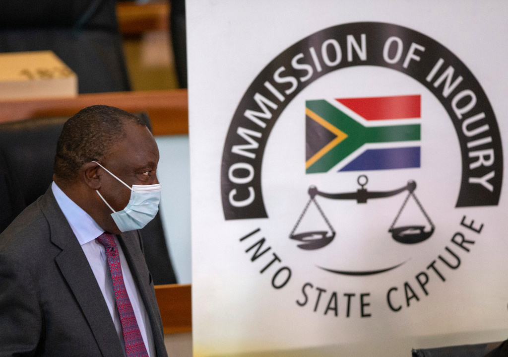 FILE - South African President Cyril Ramaphosa appears on behalf of the ruling African National Congress party at the Zondo Commission of Inquiry into state corruption in Johannesburg, South Africa, on April 29, 2021. (AP Photo/Kim Ludbrook/Pool, File)