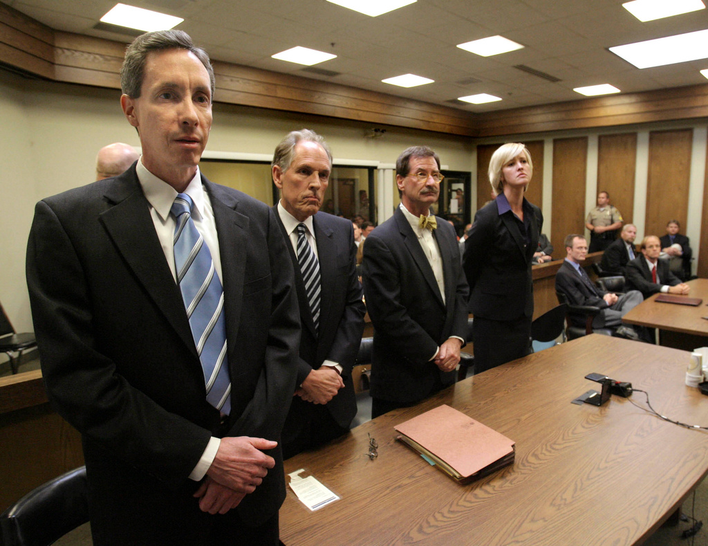 FILE - Warren Jeffs, left, and council react to the verdict against him Tuesday, Sept. 25, 2007, in St. George, Utah. (Jud Burkett/The Spectrum via AP, File)