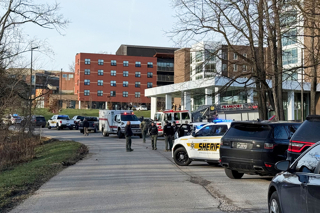 FILE - Law enforcement responds to a shooting at Whitney Moore Young Jr. Hall on Kentucky State University's campus in Frankfort, Ky., Tuesday, Dec. 9, 2025. (Hannah Brown/The State Journal via AP, File)