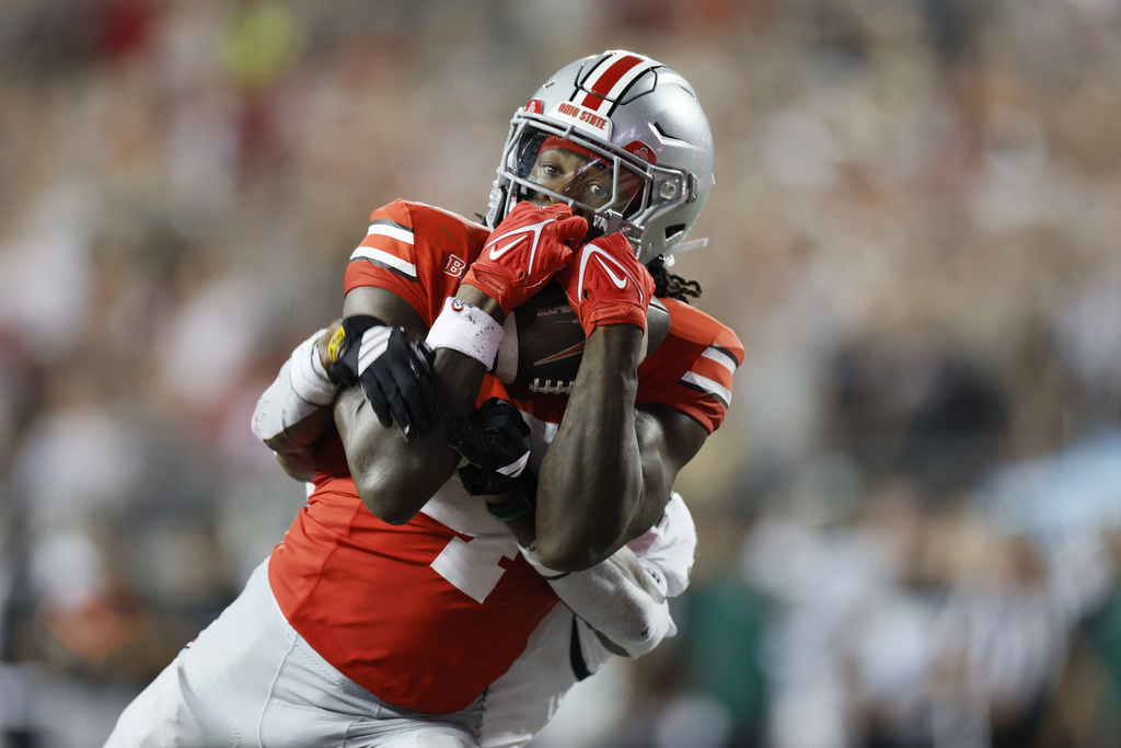 Ohio State receiver Jeremiah Smith catches a touchdown against Ohio during the second half of an NCAA college football game, Saturday, Sept. 13, 2025, in Columbus, Ohio. (AP Photo/Jay LaPrete)