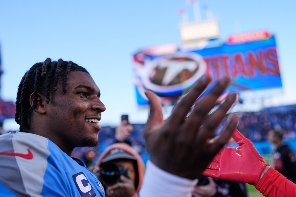 Tennessee Titans quarterback Cam Ward (1) celebrates after an NFL football game against the Kansas City Chiefs, Sunday, Dec. 21, 2025, in Nashville, Tenn. (AP Photo/George Walker IV)