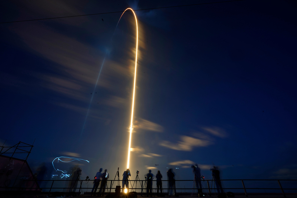 FILE - In this photo made with a long exposure, a SpaceX Falcon 9 rocket, with four private citizens onboard, lifts off from Kennedy Space Center's Launch Pad 39-A, Wednesday, Sept. 15, 2021, in Cape Canaveral, Fla. (AP Photo/John Raoux, File)