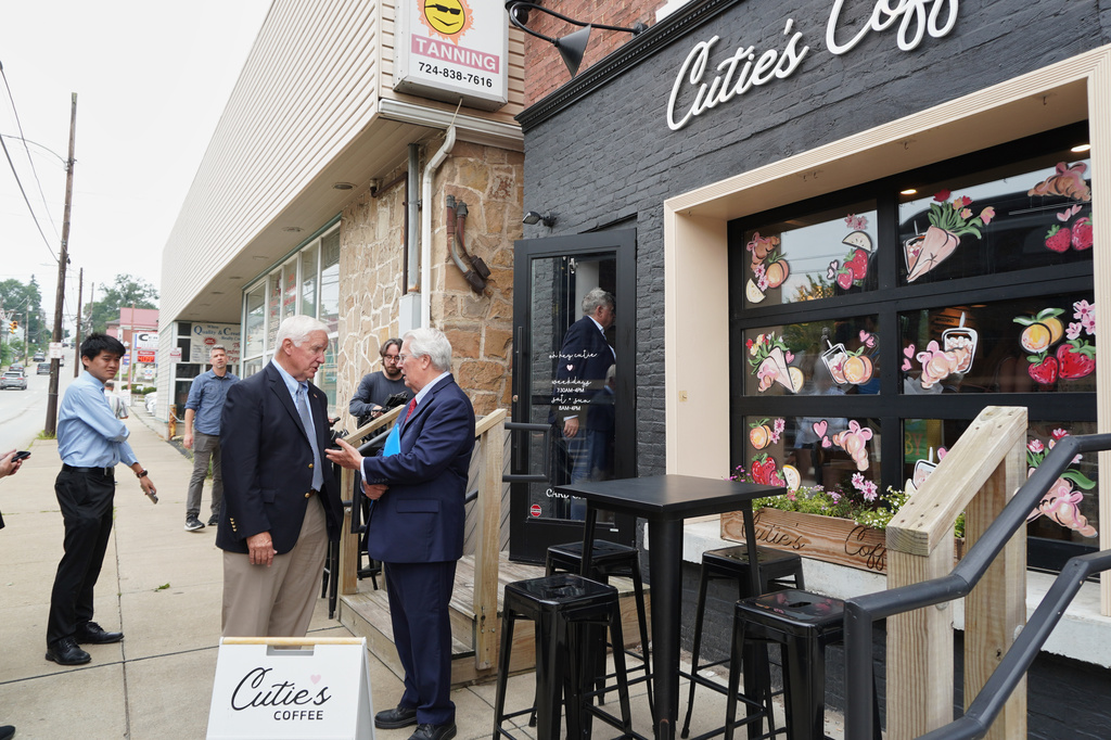 Former Pennsylvania Gov. Tom Corbett speaks to lawyer Jon Delano outside a coffee shop in Greenburg, Pa., on Tuesday, July 7, 2026. (Keep Our Republic via AP)