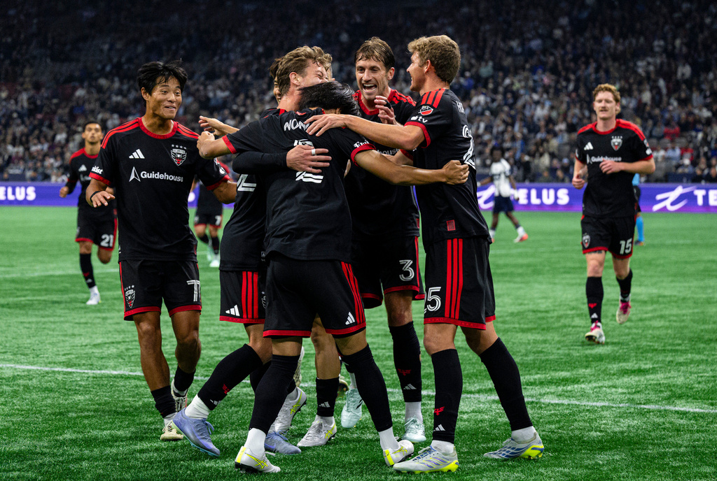 D.C. United's Kimito Nono (2) celebrates with teammates after scoring against the Vancouver Whitecaps during the first half of an MLS soccer match in Vancouver, British Columbia, Saturday, Sept. 26, 2026. (Jacob Mallari/The Canadian Press via AP)