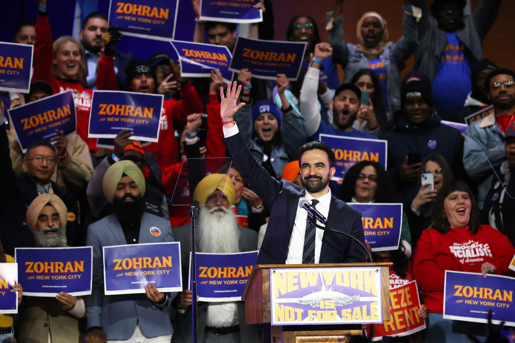 New York City mayoral candidate Zohran Mamdani waves to the crowd during a rally, Sunday, Oct. 26, 2025, in New York. (AP Photo/Heather Khalifa)