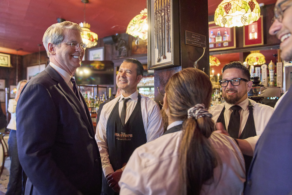 Treasury Secretary Scott Bessent visits Martin's Tavern, Monday, Sept. 1, 2025, in the Georgetown neighborhood of Washington, during an area restaurant tour about no taxes on tips and overtime. (AP Photo/Jacquelyn Martin)