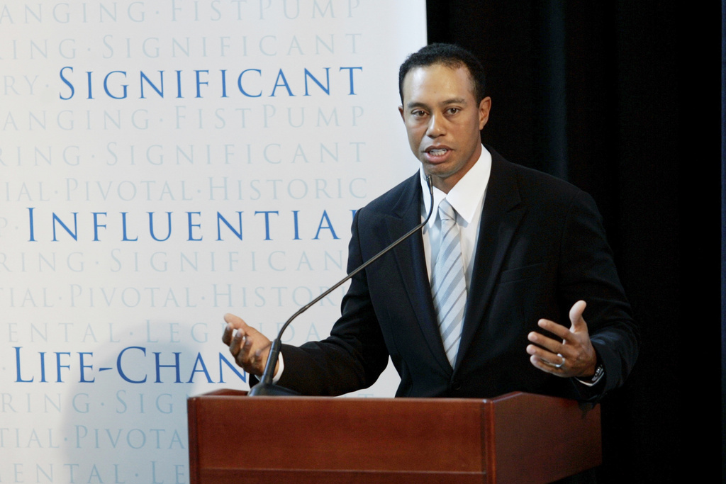 FILE - Golfer Tiger Woods announces the launch of a nationwide youth program called the "Fist Pump Challenge" in Anaheim, Calif., Jan. 21, 2008. (AP Photo/Damian Dovarganes, File)