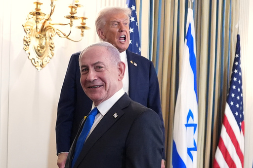 President Donald Trump speaks upon departing a news conference with Israeli Prime Minister Benjamin Netanyahu, in foreground, in the State Dining Room of the White House, Monday, Sept. 29, 2025, in Washington. (AP Photo/Evan Vucci) President Donald Trump speaks upon departing a news conference with Israeli Prime Minister Benjamin Netanyahu, in foreground, in the State Dining Room of the White House, Monday, Sept. 29, 2025, in Washington. (AP Photo/Evan Vucci)