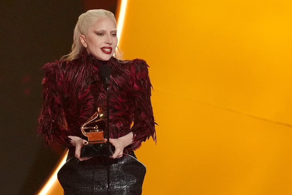 Lady Gaga accepts the award for best pop vocal album for "Mayhem" during the 68th annual Grammy Awards on Sunday, Feb. 1, 2026, in Los Angeles. (AP Photo/Chris Pizzello)