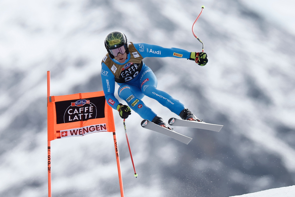 Italy's Giovanni Franzoni speeds down the course during an alpine ski, men's World Cup downhill, in Wengen, Switzerland, Saturday, Jan. 17, 2026. (AP Photo/Gabriele Facciotti)
