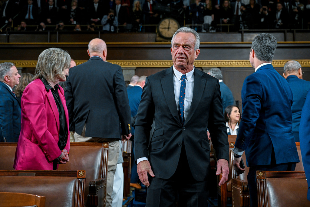 Secretary of Health and Human Services Robert F. Kennedy Jr. enters the House Chamber before President Donald Trump delivers the State of the Union address to a joint session of Congress in the House chamber at the U.S. Capitol in Washington, Tuesday, Feb. 24, 2026. (Kenny Holston/The New York Times via AP, Pool)