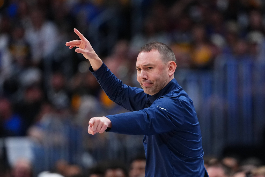 Denver Nuggets head coach David Adelman reacts during the first half in Game 2 of a first-round NBA playoffs basketball series against the Minnesota Timberwolves, Monday, April 20, 2026, in Denver. (AP Photo/Jack Dempsey)
