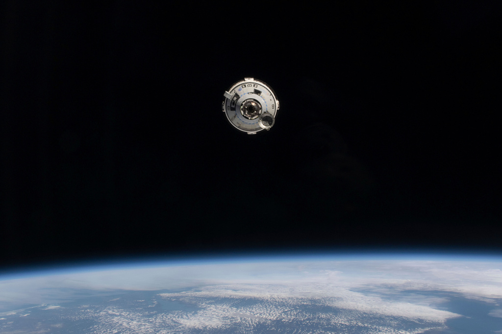 FILE - In this photo provided by NASA, the Boeing Starliner spacecraft with astronauts Butch Wilmore and Suni Williams aboard approaches the International Space Station on June 6, 2024. (NASA via AP, File)