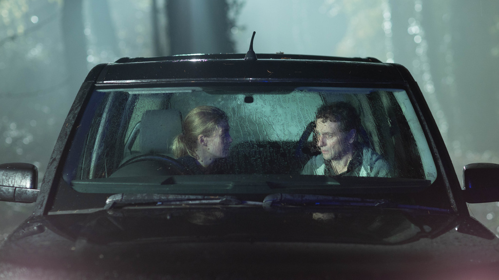 This image released by XYZ Films shows Rosamund Pike, left, and Matthew Rhys in a scene from "Hallow Road." (XYZ Films via AP)