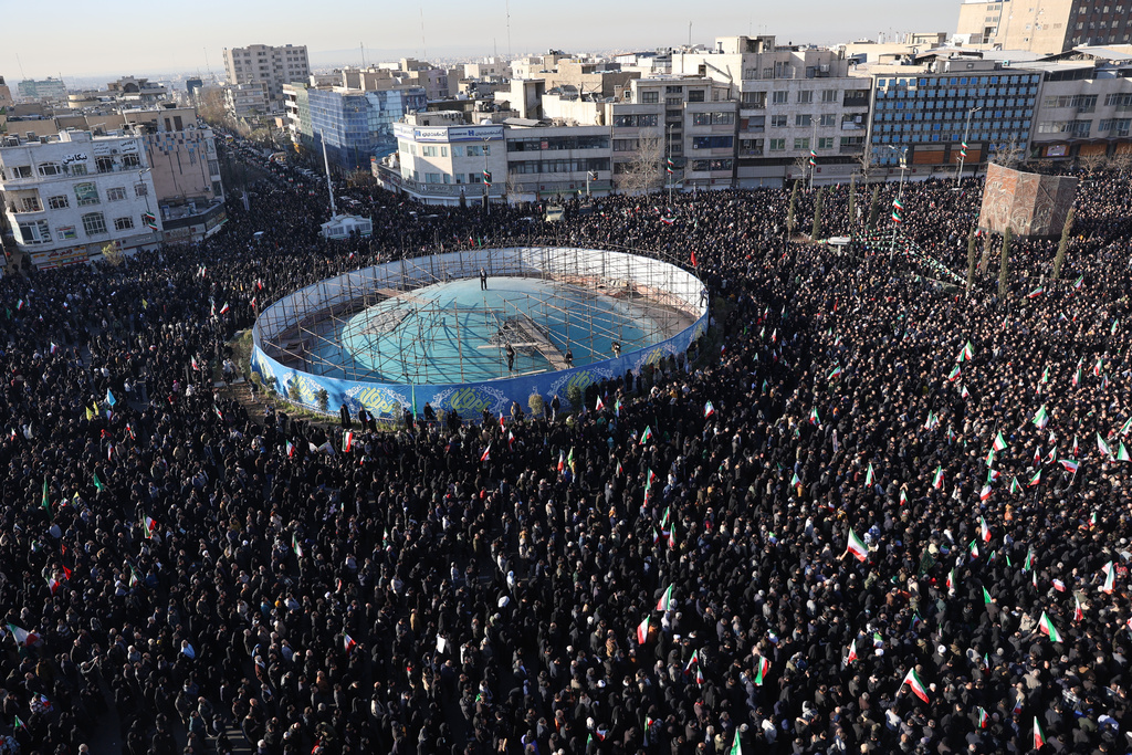Government supporters gather in mourning after state TV officially announced the death of Iranian Supreme Leader Ayatollah Ali Khamenei, in Tehran, Iran, Sunday, March 1, 2026. (AP Photo/Vahid Salemi)