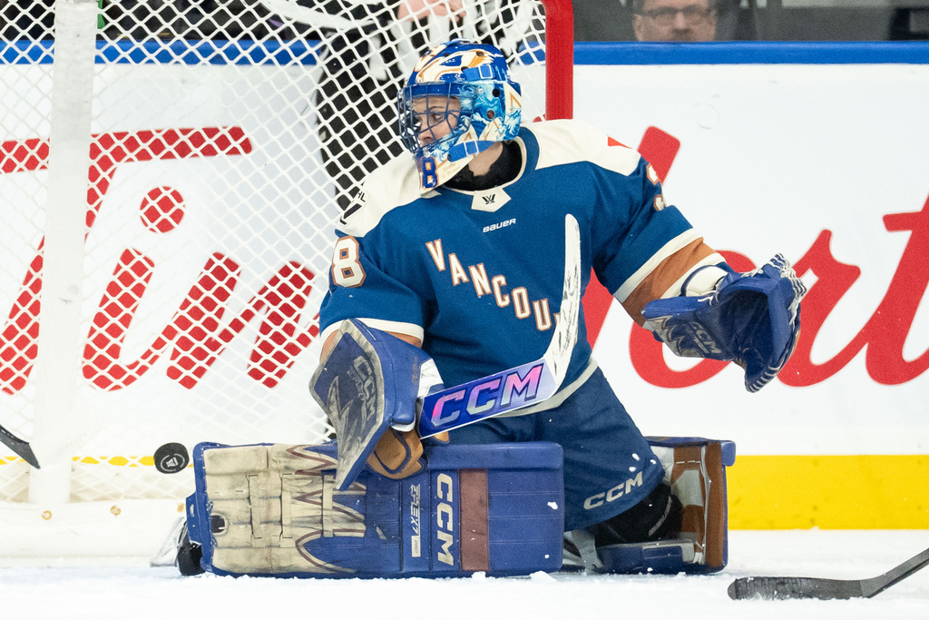 Toronto Sceptres' Sara Hjalmarsson, not seen, scores on Vancouver Goldeneyes goaltender Emerance Maschmeyer during the first period of an PWHL hockey game in Vancouver, Sunday, March 1, 2026. (Ethan Cairns/The Canadian Press via AP)