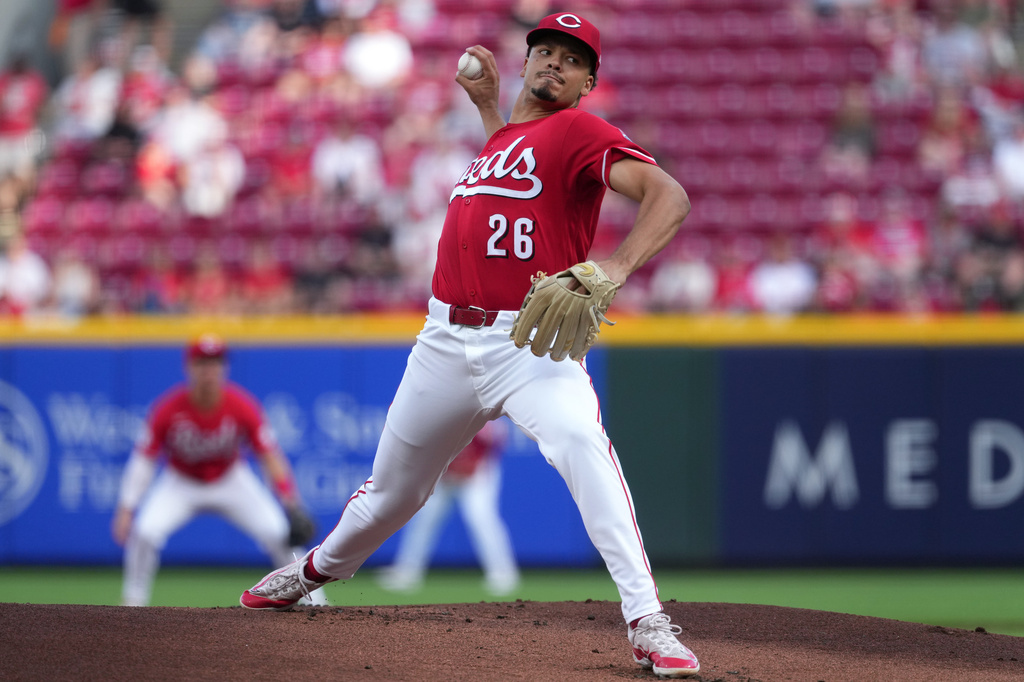 Cincinnati Reds' Chase Burns delivers a pitch during the first inning of a baseball game against the Colorado Rockies', Tuesday, April 28, 2026, in Cincinnati. (AP Photo/Kareem Elgazzar)