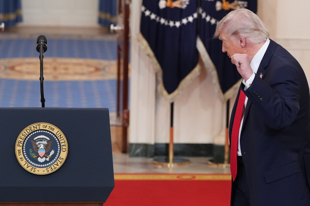 President Donald Trump gestures after speaking about the Iran war from the Cross Hall of the White House on Wednesday, April 1, 2026, in Washington. (AP Photo/Alex Brandon, Pool)