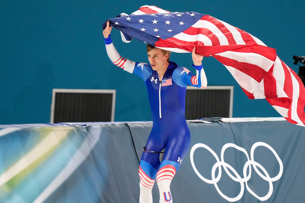 Gold medallist Jordan Stolz of the U.S. celebrates after the men's 500 meters speedskating race at the 2026 Winter Olympics, in Milan, Italy, Saturday, Feb. 14, 2026. (AP Photo/Luca Bruno)