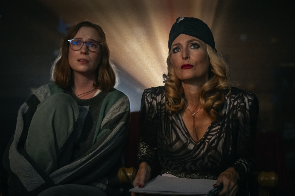 This image released by Mubi shows Hannah Einbinder, left, and Gillian Anderson from the film "Teenage Sex and Death at Camp Miasma." (Ryan Plummer/Mubi via AP)