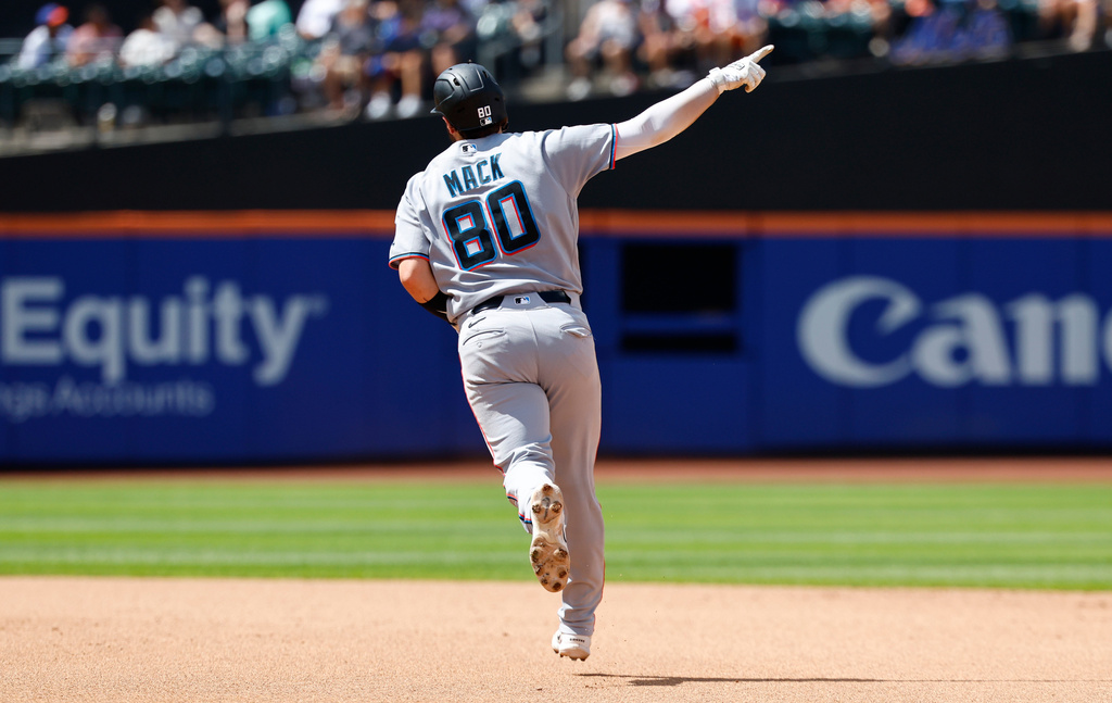 Miami Marlins' Joe Mack reacts while running the bases after hitting home run against the New York Mets during the fifth inning of a baseball game, Sunday, Aug. 2, 2026, in New York. (AP Photo/Noah K. Murray)